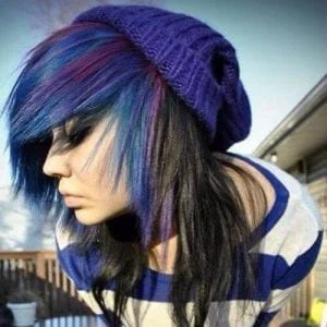 Long emo hairstyles for girls with blue highlights and side-swept bangs