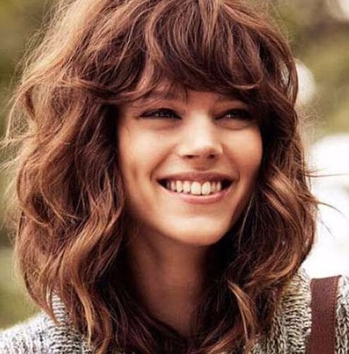 hairstyles for curly hair bangs