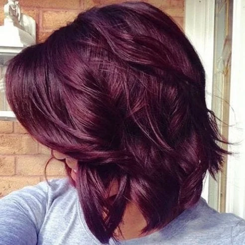 Plum burgundy hair color - perfect for pale skin tones with blue or green eyes