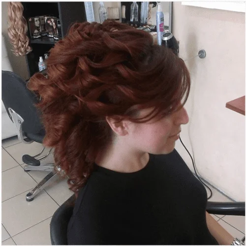 dark brown hair with red highlights