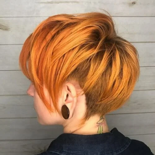 Trendy mauve stacked bob haircut for thick hair with layered back for volume control