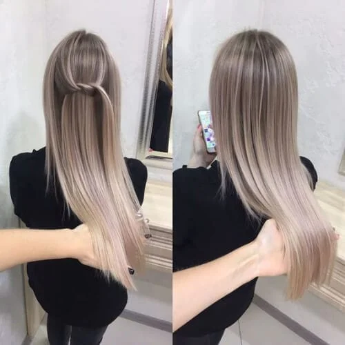 Straight sleek hair with ash blonde ombre coloring - layered haircut with perfect styling