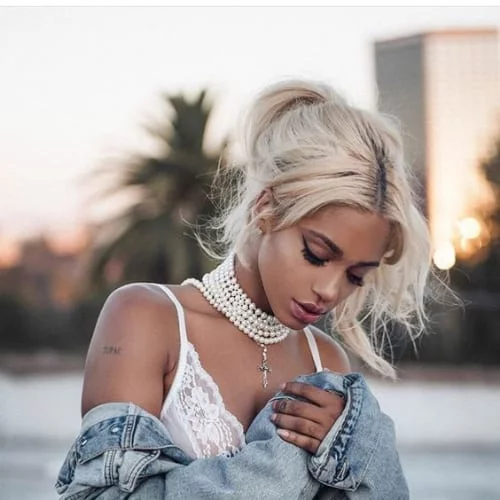 small ponytail side parted bangs blonde hairstyles