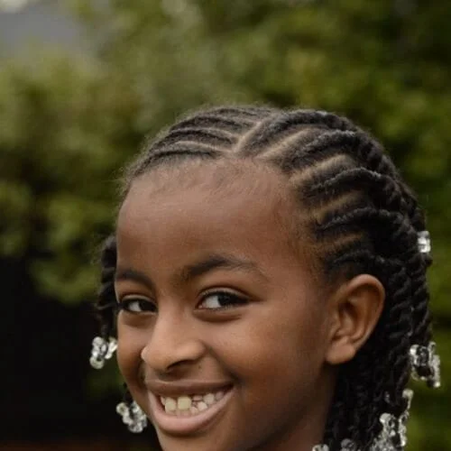 Rope twists of a woman with beaded ends