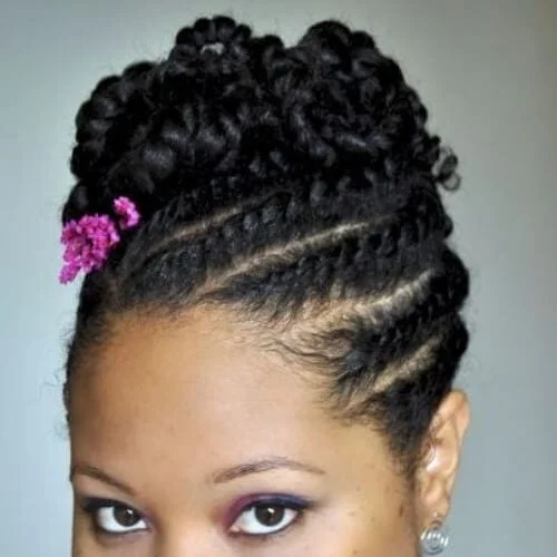 Elegant flat twist updo with flower accessories - perfect for weddings and special events