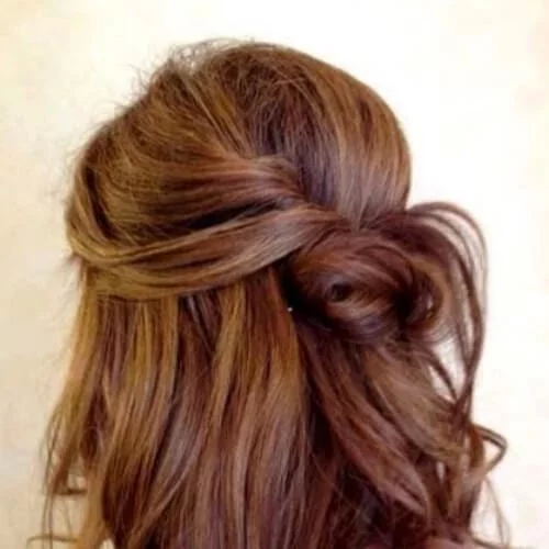 Half up half down hairstyle featuring chestnut brown hair - easy casual styling option