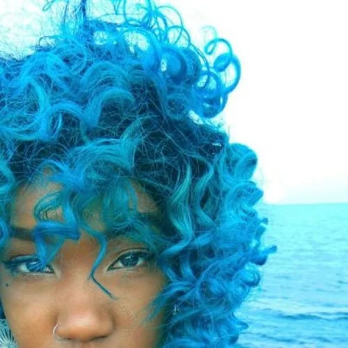 aqua curly hair with bangs