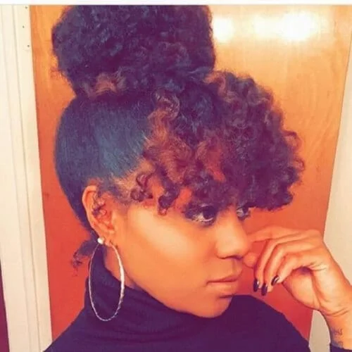 bun curly hair with bangs