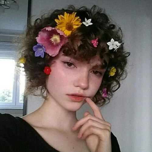 cool curly hair with bangs