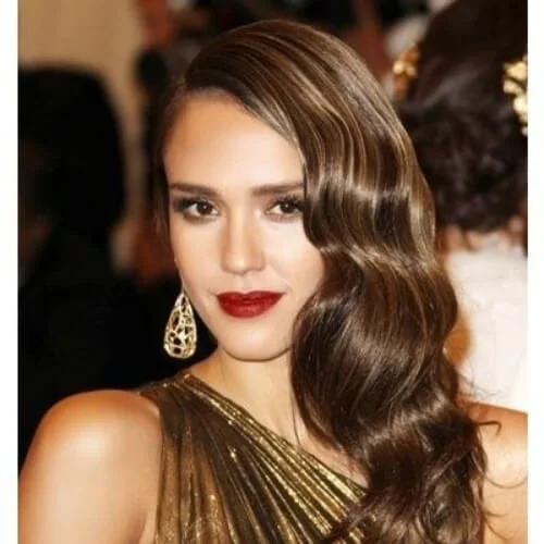 Jessica Alba sleek side hairstyle with small braid detail - perfect for prom