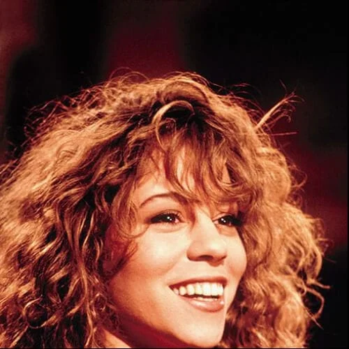 mariah carey curly hair with bangs