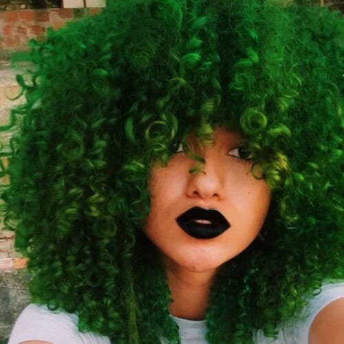 moss green curly hair with bangs