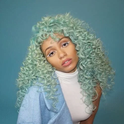 sea foam curly hair with bangs