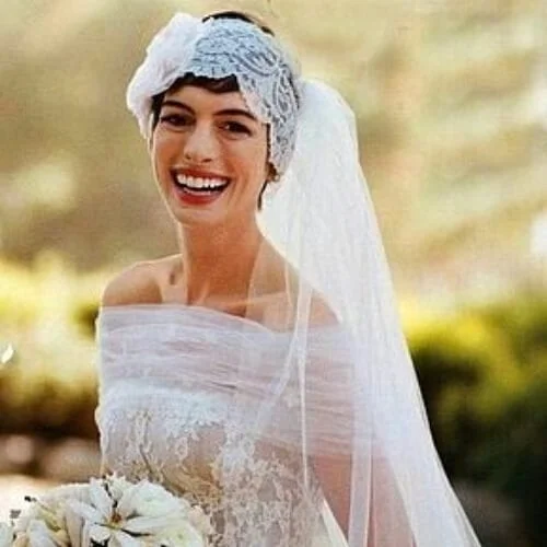 Anne Hathaway Valentino wedding hairstyles for short hair with vintage headband - celebrity bridal inspiration