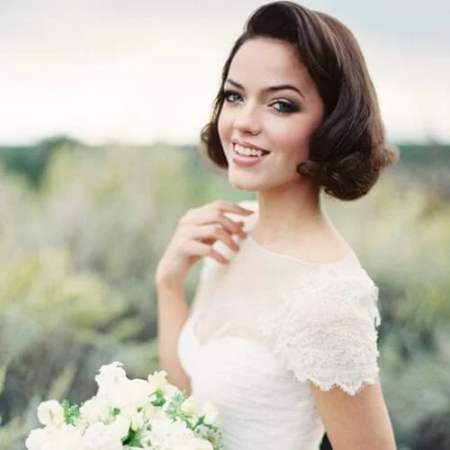 Elegant wedding hairstyles for short hair with vintage curls and classic styling - timeless bridal beauty