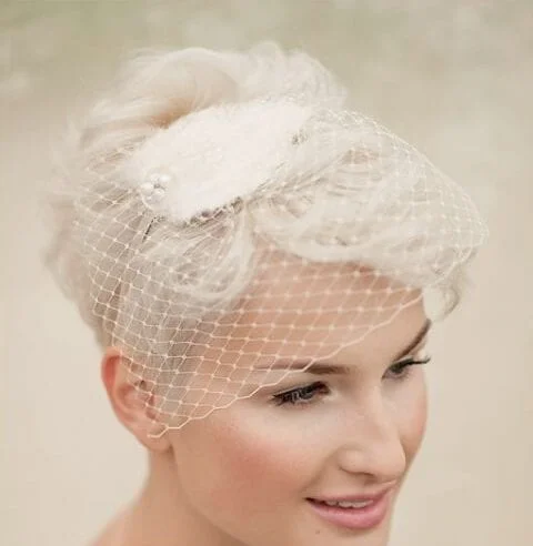 ivory birdcage veil wedding hairstyles for short hair