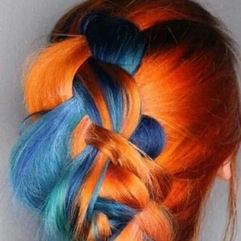 Blue and orange two tone hair color with complementary contrasting shades - vibrant split dye look