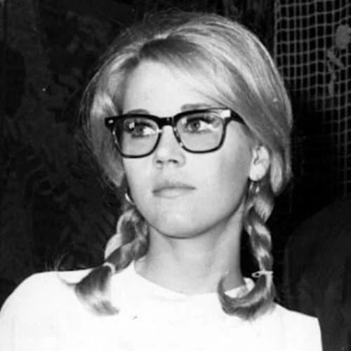 Jane Fonda with youthful pigtails hairstyle - early career look showcasing her versatile style