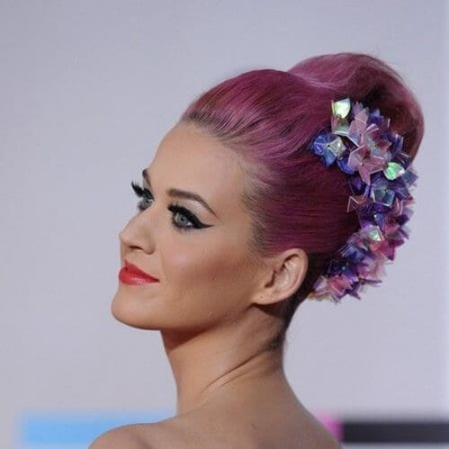 classic french twist with lots of volume and an iridescent ribbon hair accessory at the 2011 American Music Awards katy perry hairstyles