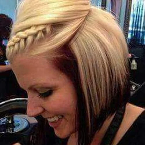 Classic A-line bob haircut with angled sides and sleek styling - perfect face-framing cut