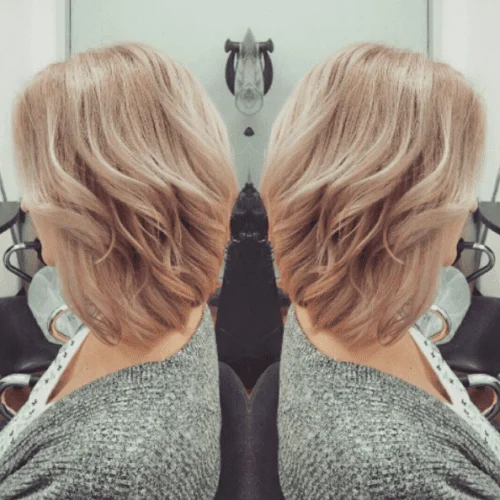 long bob with strawberry blonde hair color