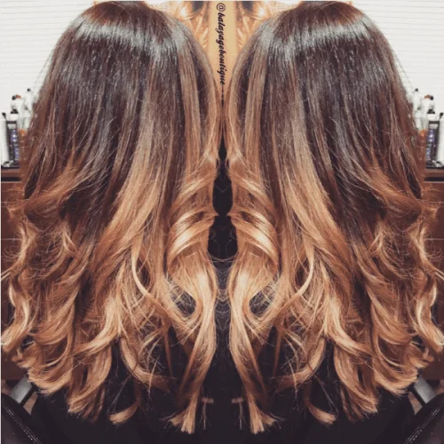 strawberry blonde ombre on wavy hair