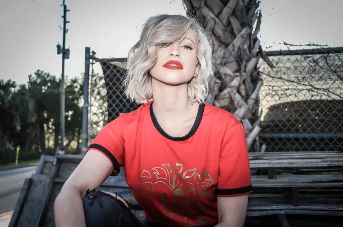 Woman in red and black shirt