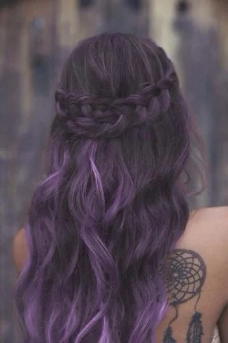 half up half down purple highlights on brunette