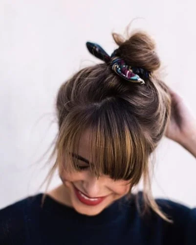 Buns With Bangs Hairstyles