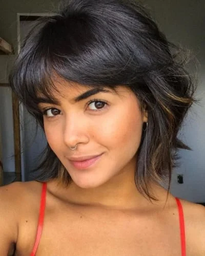 Stylish short hair with side-swept bangs - perfect casual fringe for everyday styling