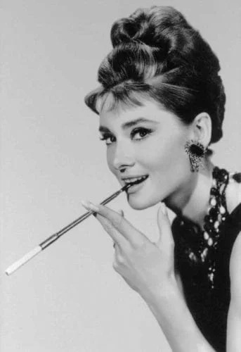 Audrey Hepburn beehive updo from Breakfast at Tiffanys - timeless elegant hairstyle