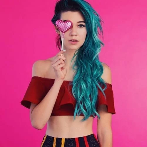 Blue and green hair with dark roots and oceanic color blend