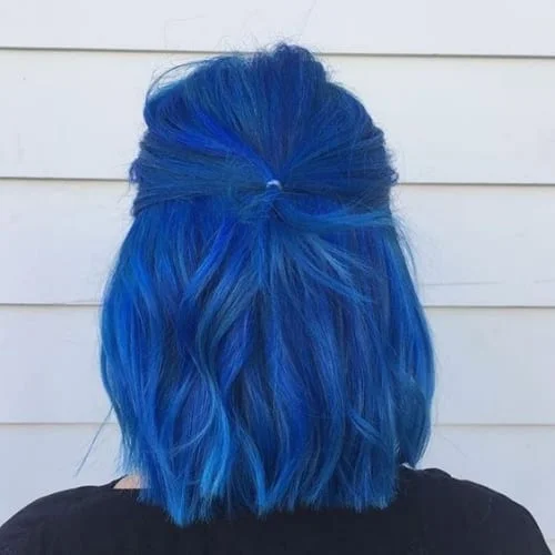 Dark blue hair color with deep intensity and vibrant undertones