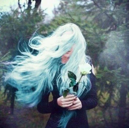 Light blue hair with cool frost-like tones perfect for winter styling