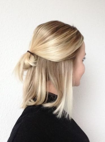 low half bun hairstyle