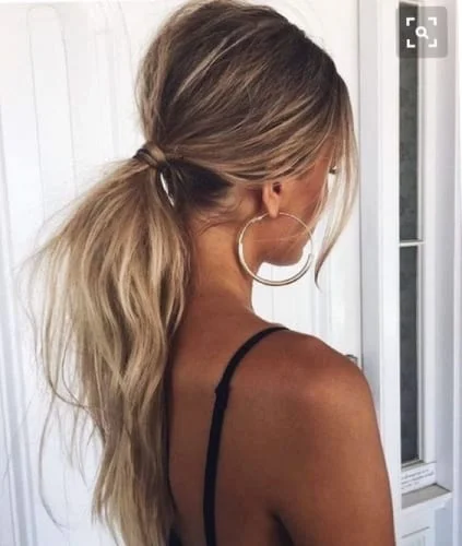 messy low ponytail