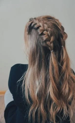 mid length plaits on long hair