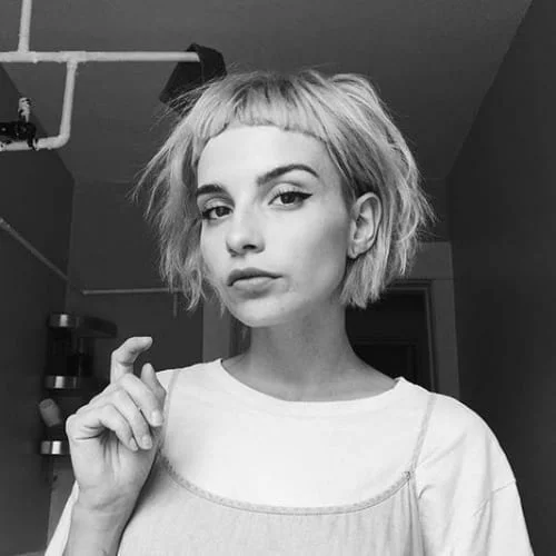 Trendy baby bangs on short hair - ultra-short fringe style for modern edgy look