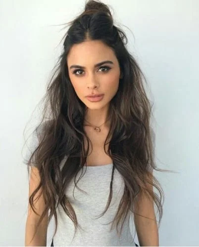 top knot on long wavy hair 