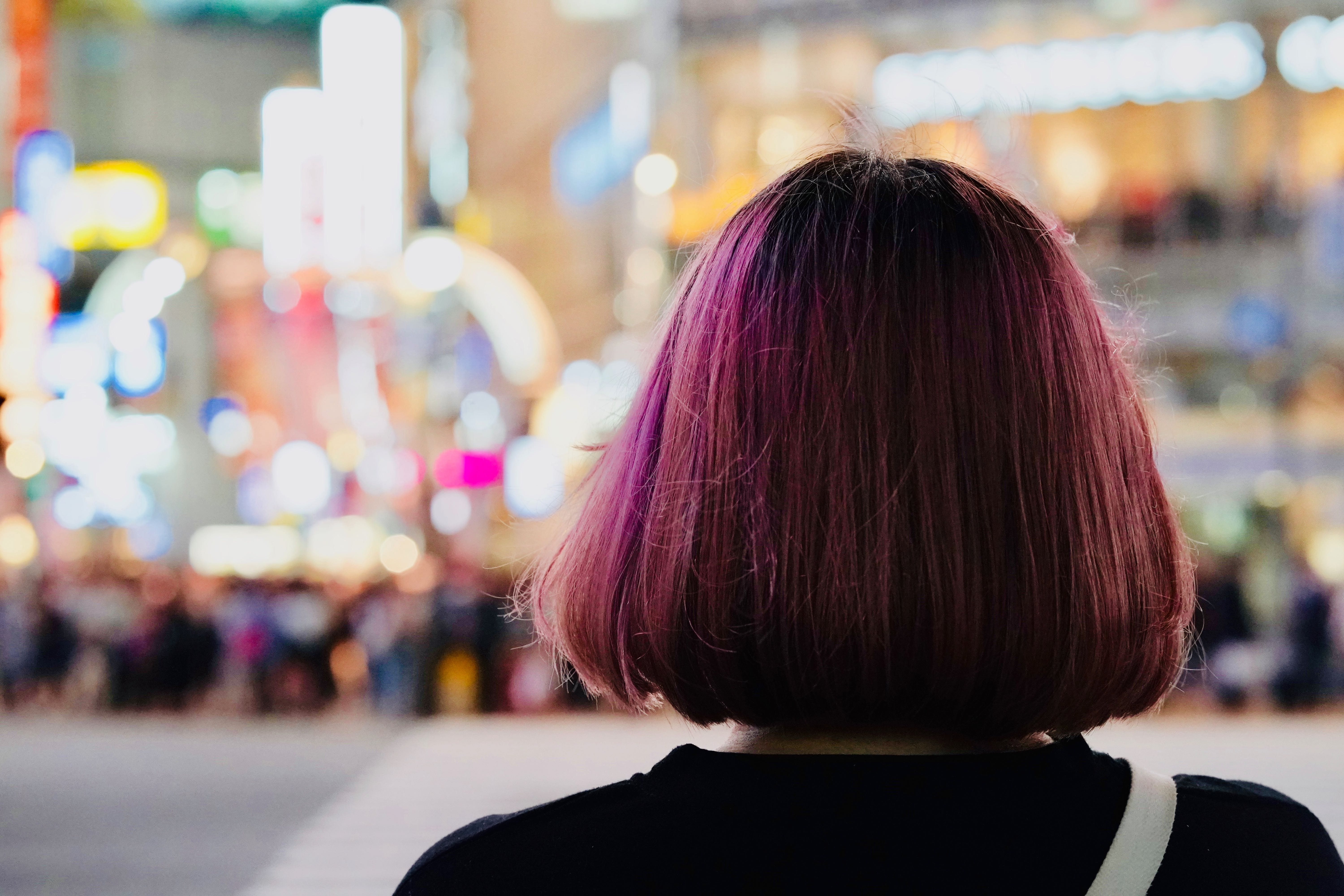 girl with short purple hair in the city
