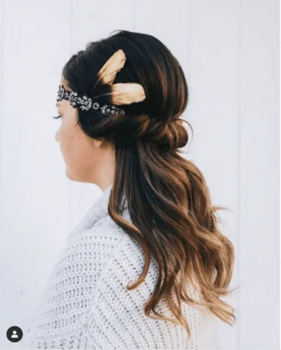 Boho-inspired Thanksgiving hairstyle with feather headband - elegant holiday hair accessory