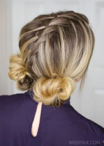 Funky braided low buns Thanksgiving hairstyle - playful and creative holiday updo