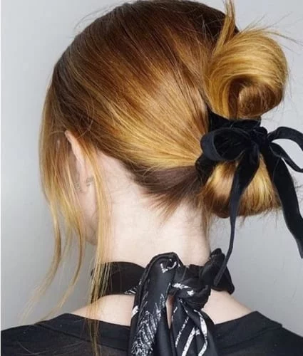 Reversed hair bow bun Thanksgiving dinner hairstyle - elegant updo for the holiday table