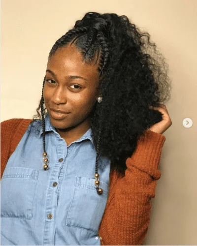 Protective Thanksgiving hairstyle with crown braids and decorated face-framing braids for natural hair