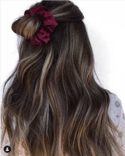Relaxed half bun Thanksgiving hairstyle with trendy scrunchie - nostalgic holiday updo