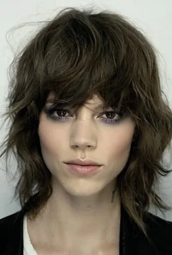 Messy medium length shag hairstyle with waves - perfect textured look for effortless styling
