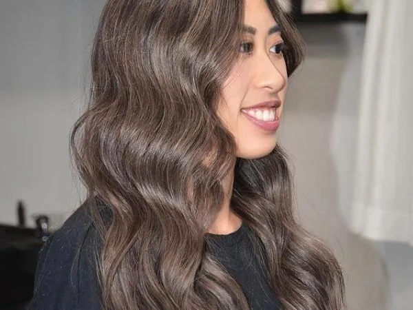 Ash Brown Beige Hair - A woman wearing a black top
