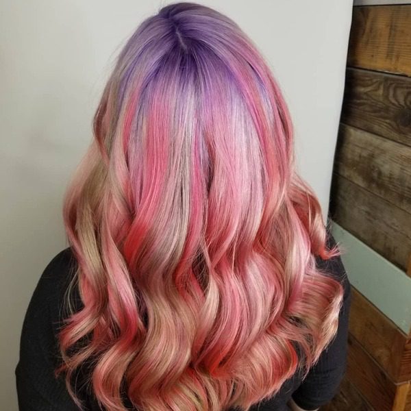 Cotton Candy Unicorn Dream Hairstyle - a woman wearing black long sleeves.