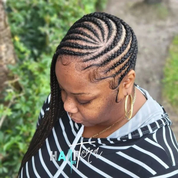 Dope Lemonade Braided Hair for Black Woman - A woman wearing a jacket