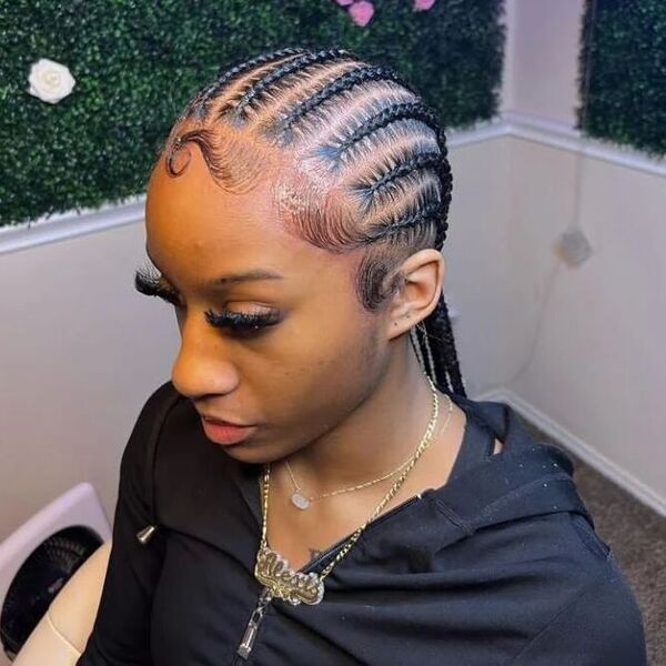 Lovely 10 stitched braids - a woman wearing a zipper down hooded jacket.